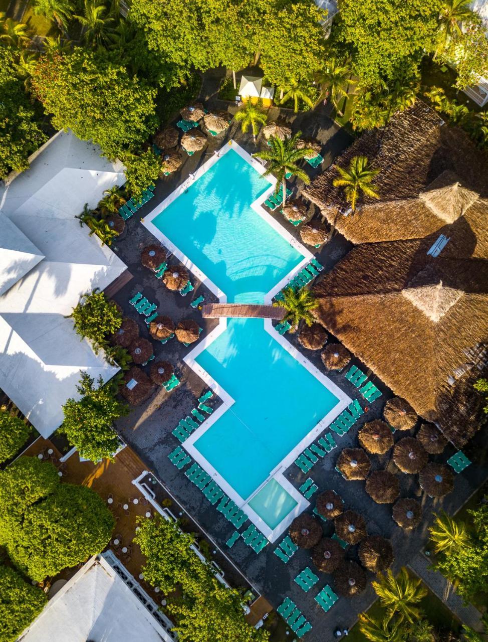 Playabachata Puerto Plata Exterior photo Aerial view of the pool at the hotel
